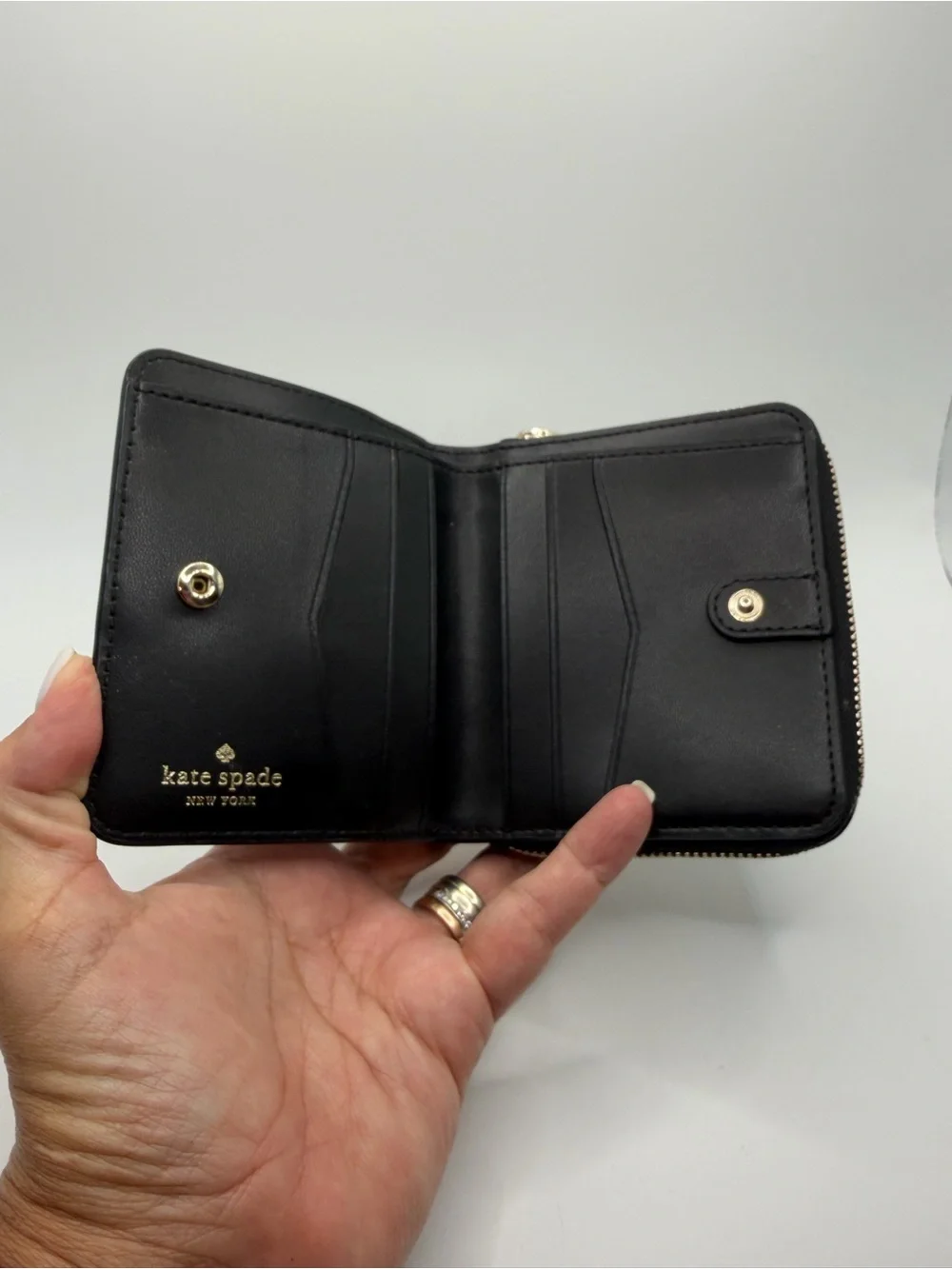 kate spade Black Compact Saffiano Zip Wallet with Gold Logo